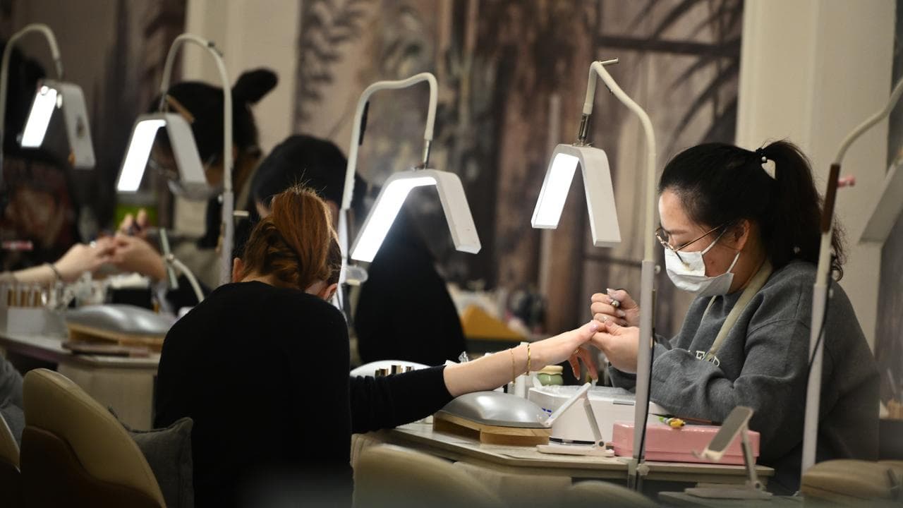 A worker in a Melbourne nail salon