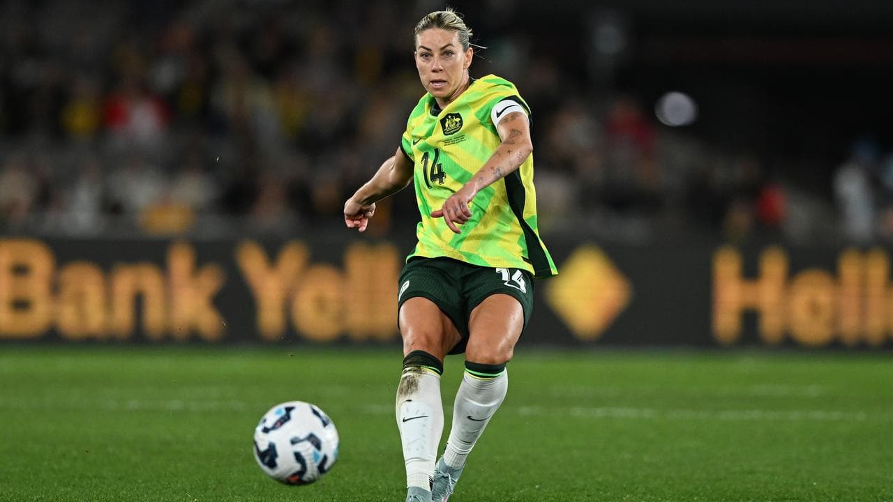 Alanna Kennedy of Australia kicks the ball