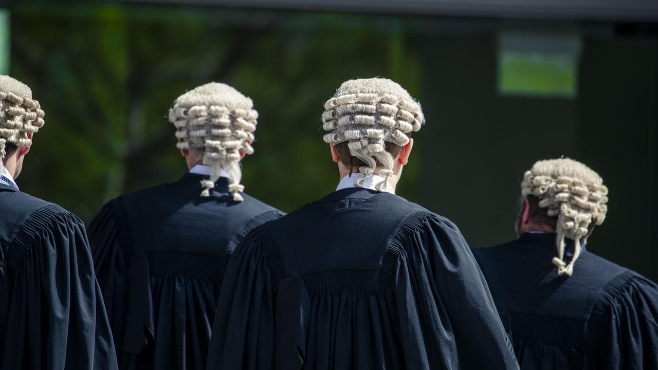 Barristers outside the Supreme Court in Brisbane.