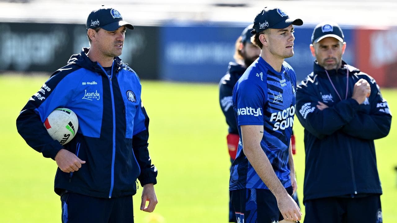 Cameron Ciraldo (left) watches  recruit Lachlan Galvin (centre)