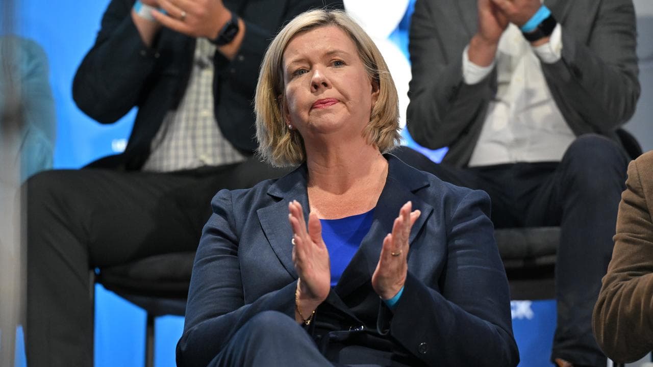 Bridget Archer clapping