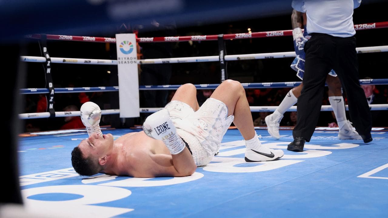 Australia's Justis Huni hits the canvas