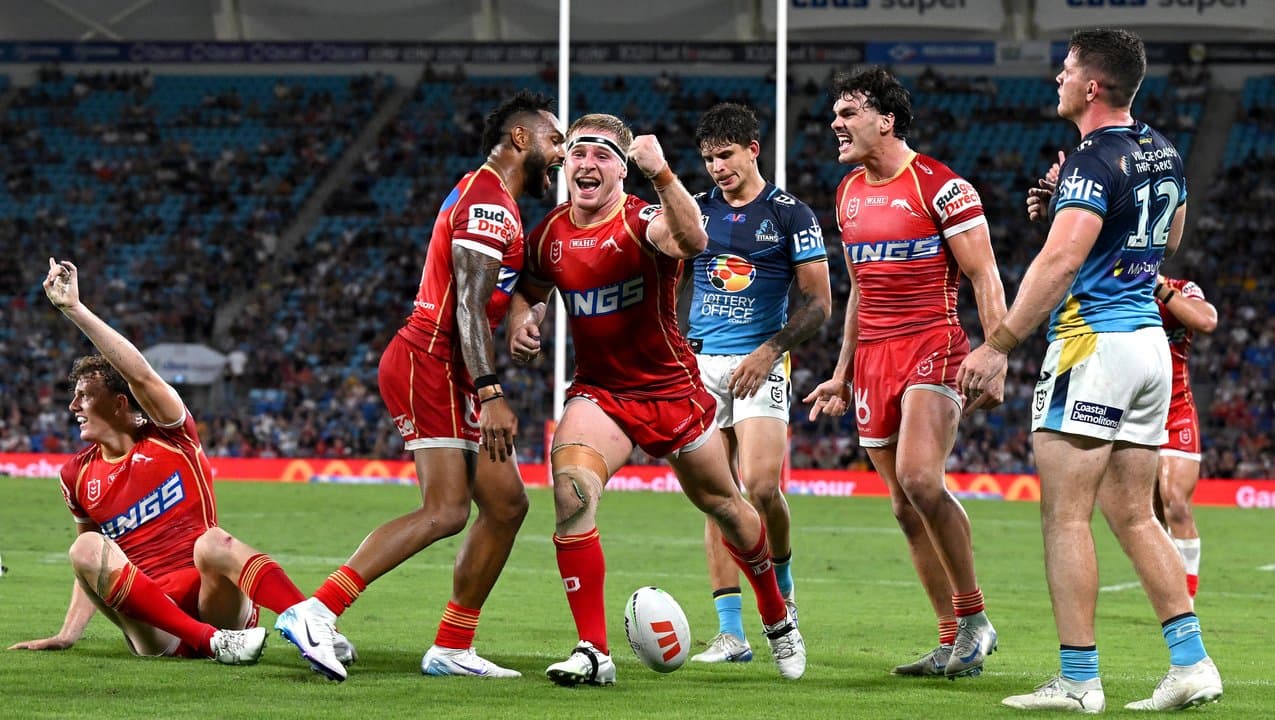 Celebrating Dolphins players.