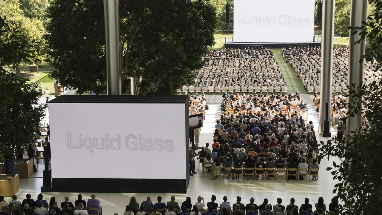 People watch a video about Apple's new developments 