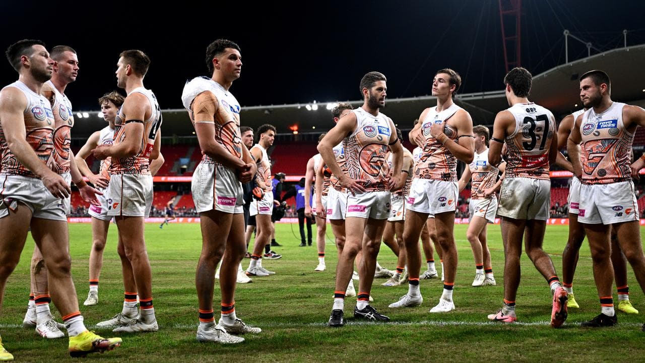 Disappointed GWS Giants players.