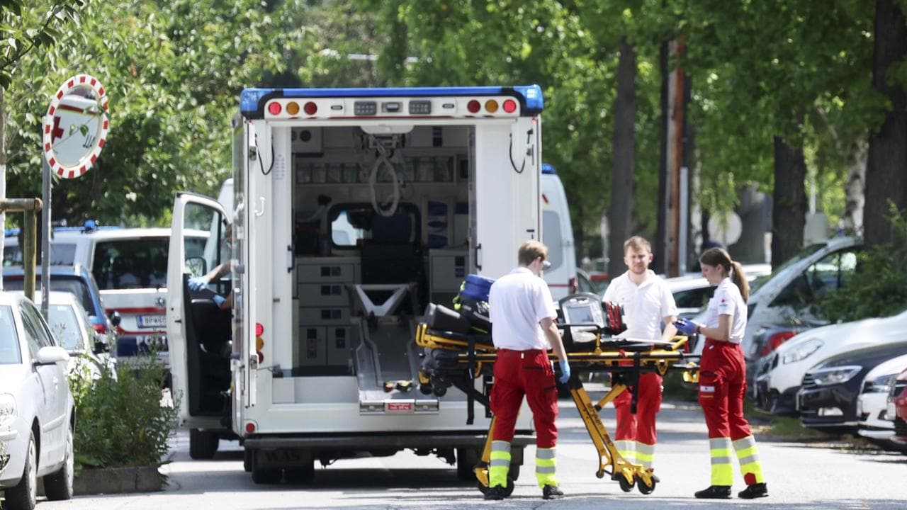Emergency personnel attend the scene of a shooting at a school in Graz
