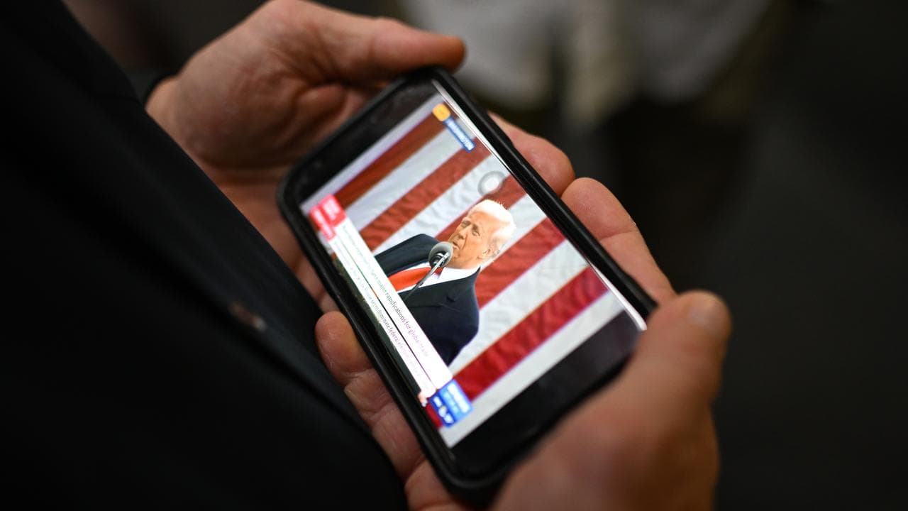 Donald Trump on a mobile phone (file image)