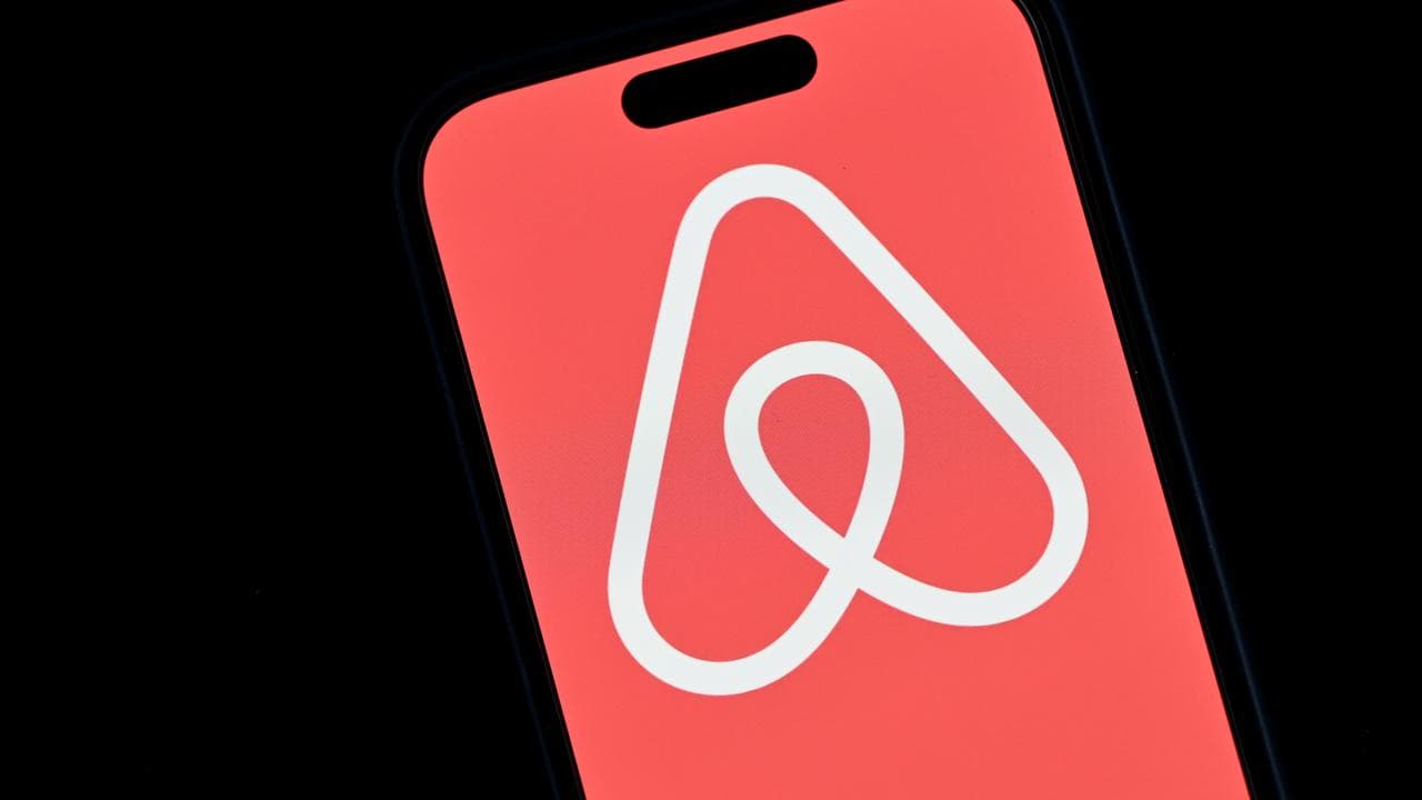 The Airbnb logo on a phone (file image)