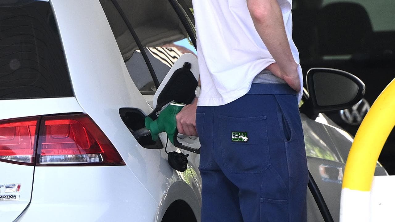 A personfills their car with petrol (file image)