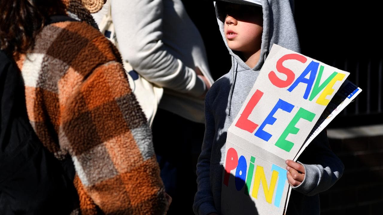 A protester hold a placard (file image)