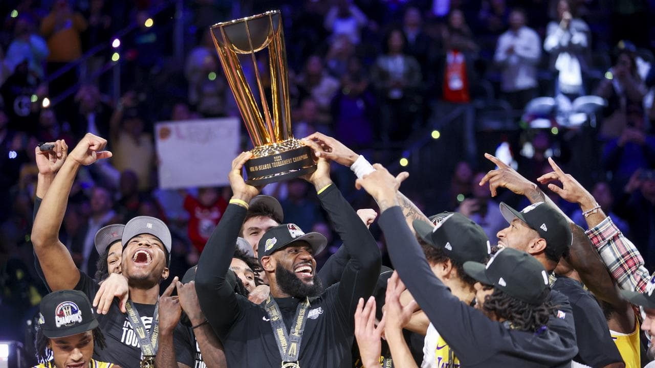 LeBron James celebrates with LA Lakers teammates.