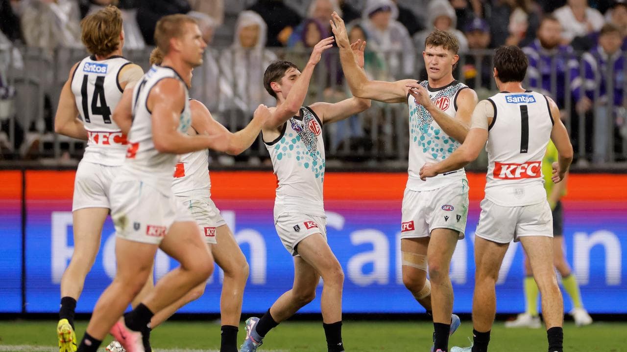 Celebrating Port Adelaide players.