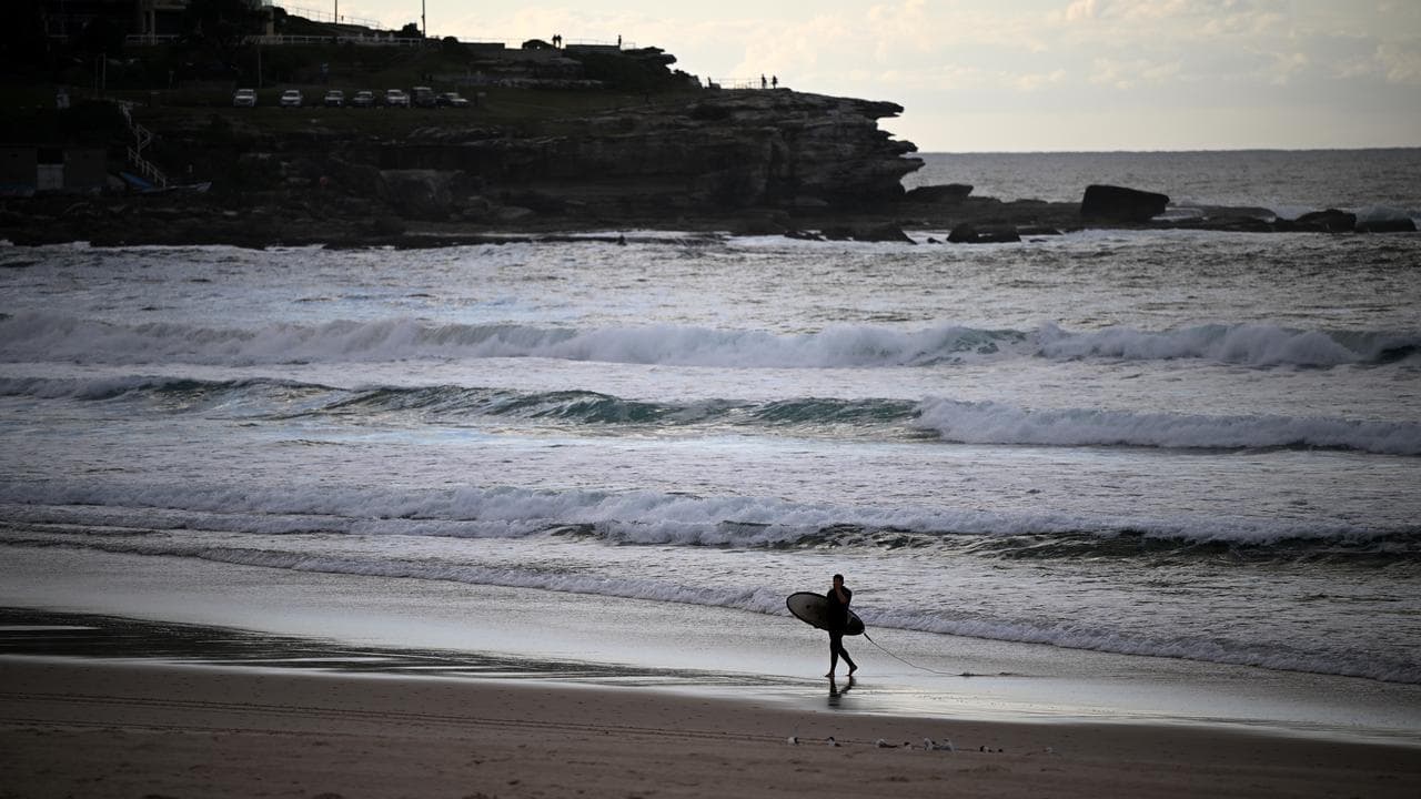 Surfers are seen at Bondi Beach