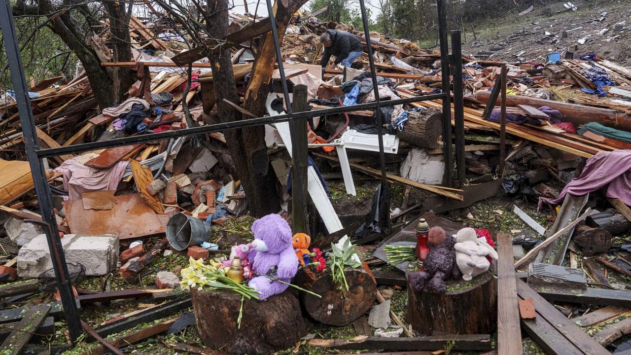 The rubble of a Ukraine house where three children were killed