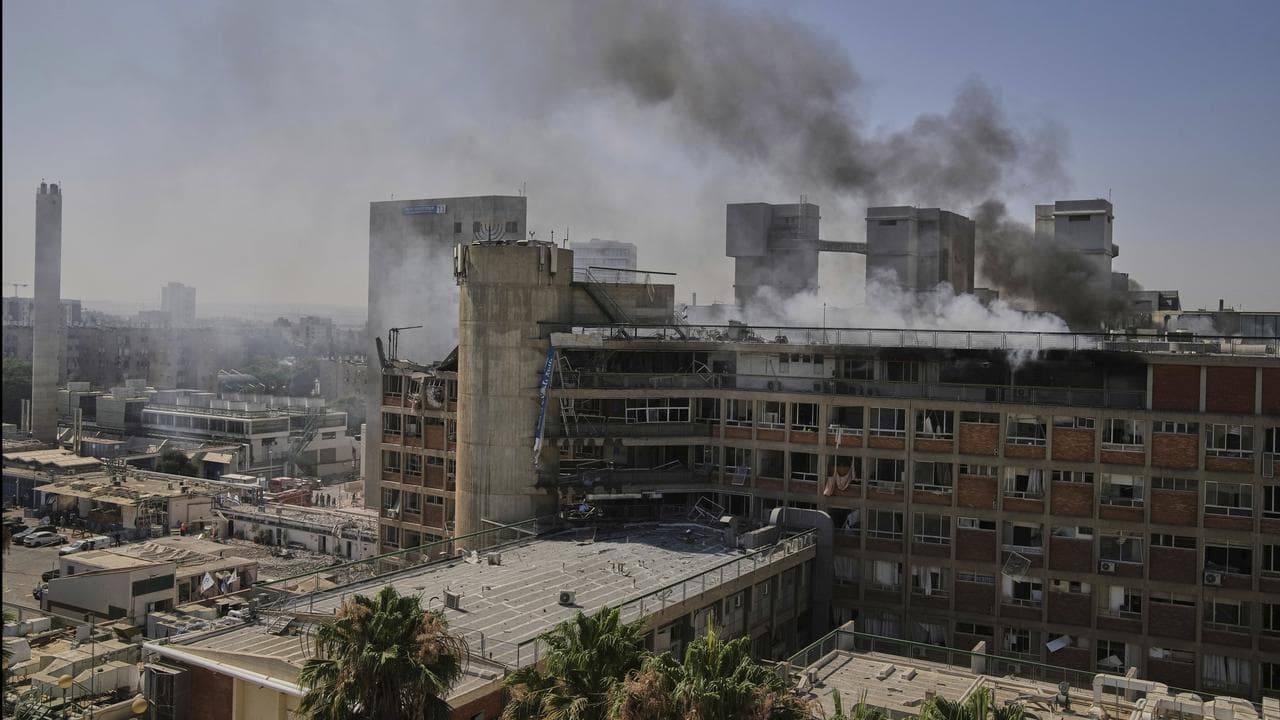 Smokes rises from a building of the Soroka hospital complex