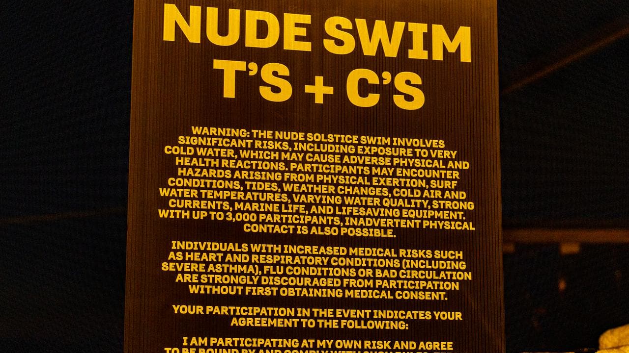 Signage at the annual nude winter solstice swim