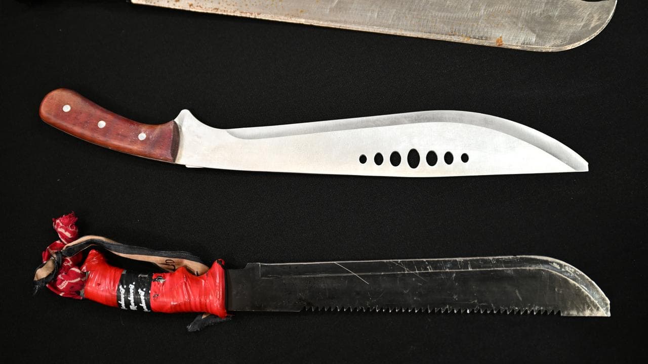 Three machetes on display.