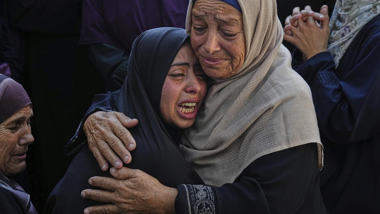 Palestinians grieve for family members in Gaza 