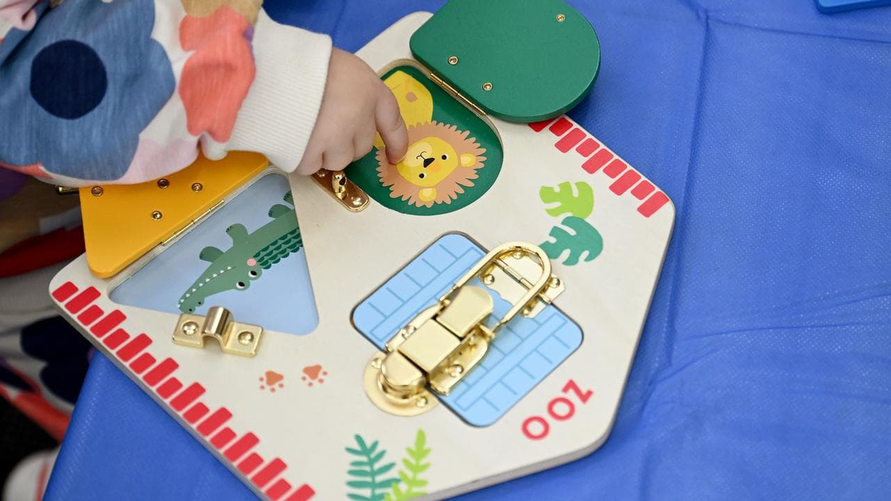 Young children playing with toys at a childcare centre