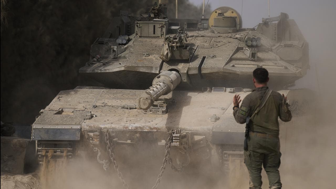 Israeli tank at a staging area near the border with the Gaza Strip