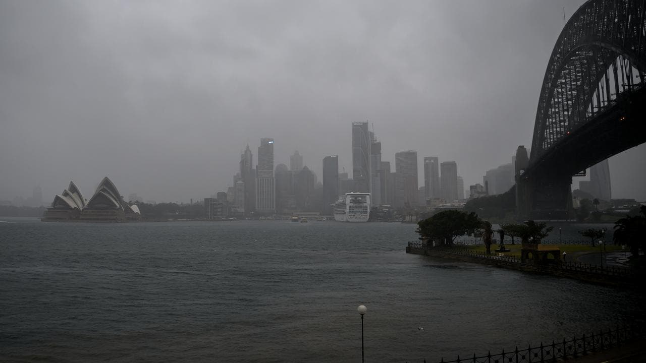 Rain falling over Sydney harbour.