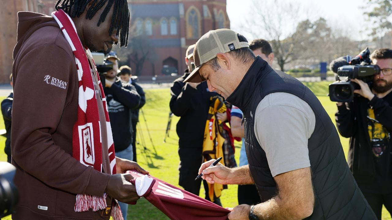 Hawk Mabior Chol and Queensland Origin legend Cameron.