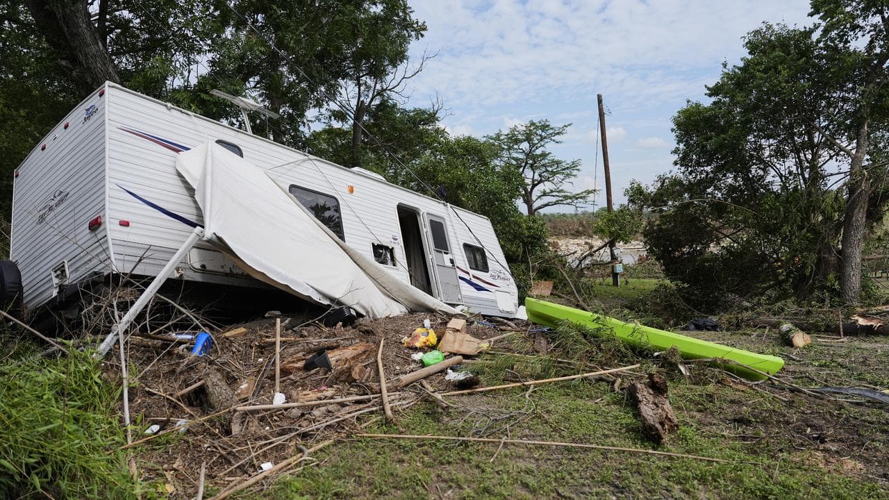 Wrecked trailer near Guadalupe River after flooding