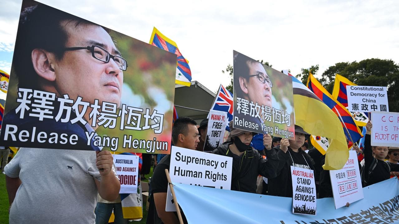 Protesters demanding the release of Yang Hengjun (file image)