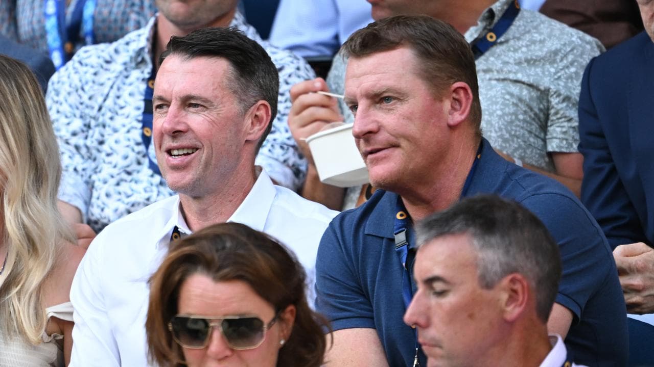 Craig McRae (left) and Michael Voss