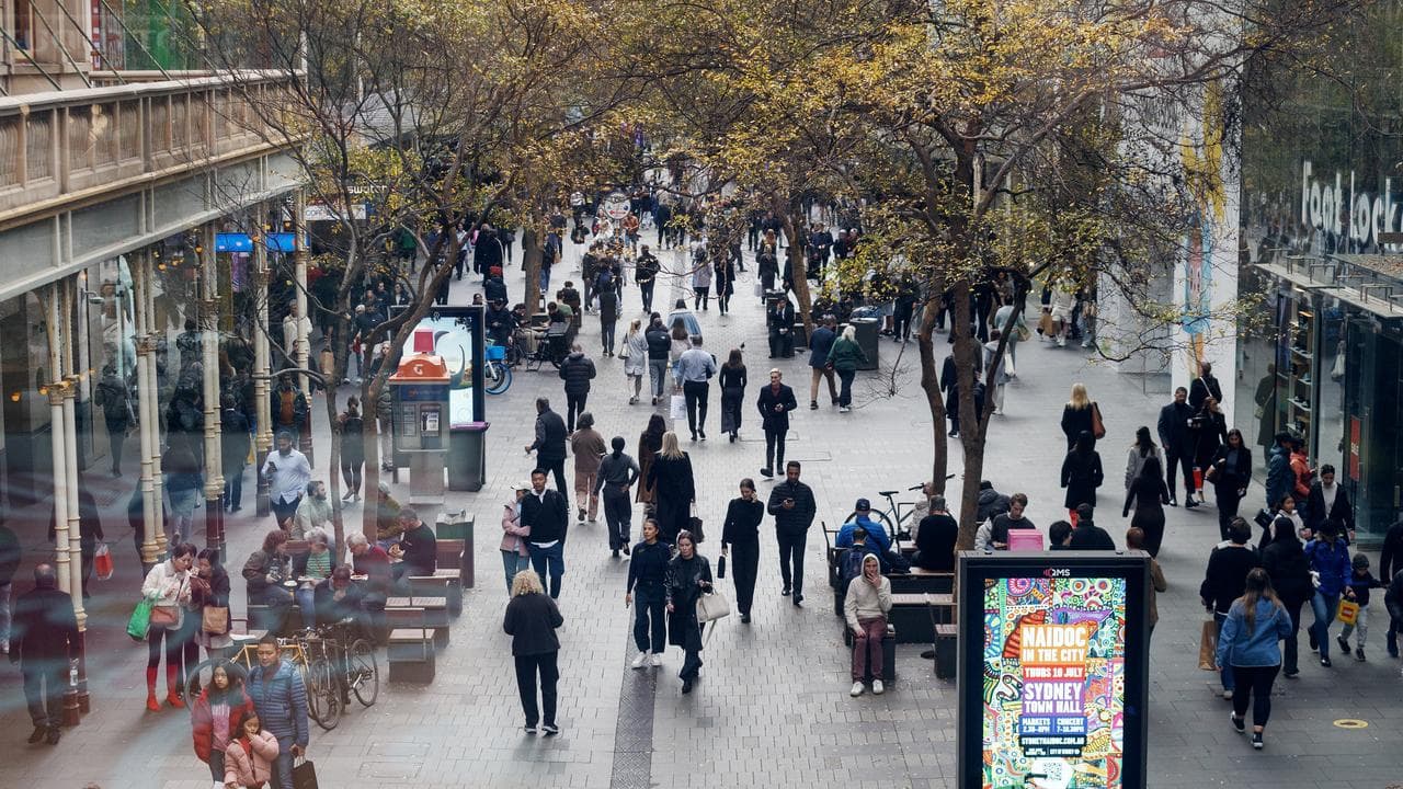People move through Pitt Street, CBD in Sydney,
