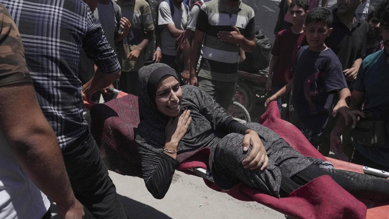 Woman after an Israeli strike on in Gaza City