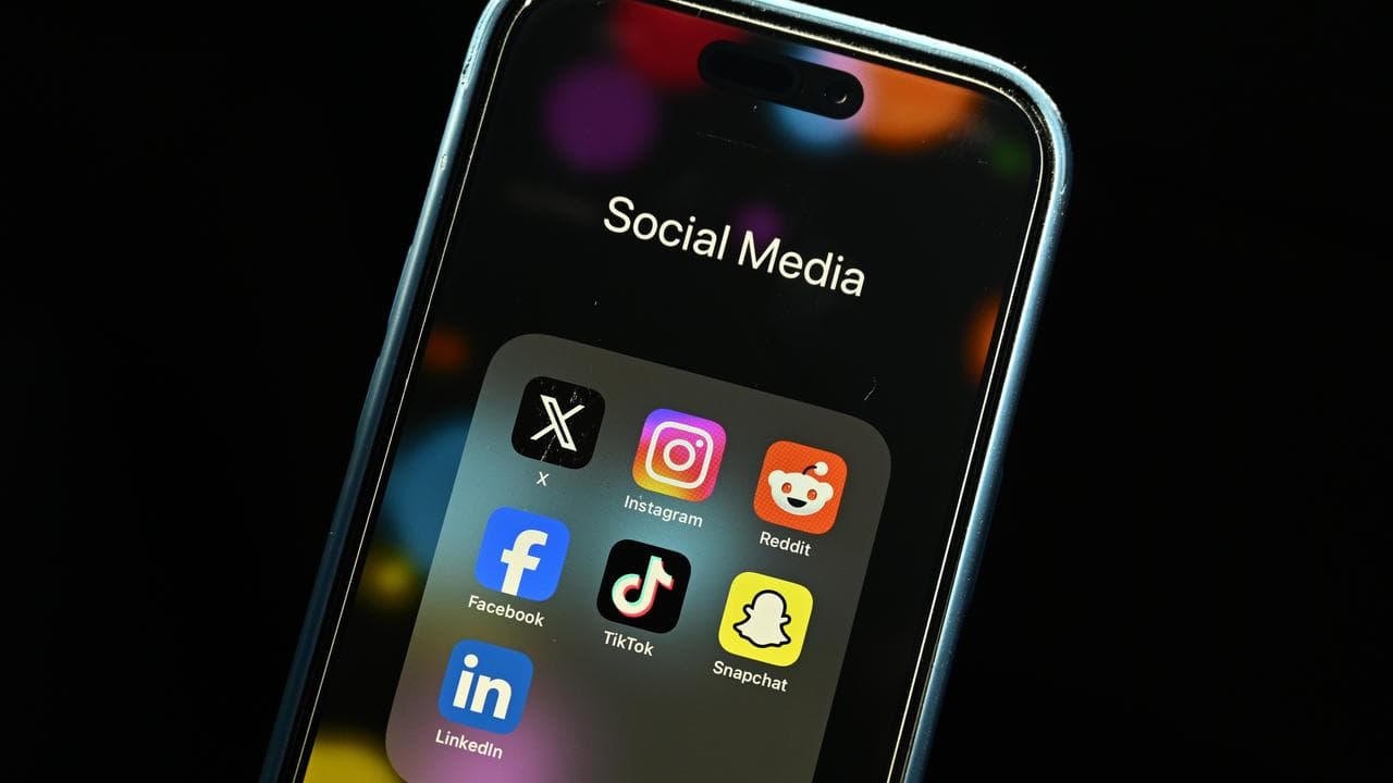 Social media apps on a phone (file image)