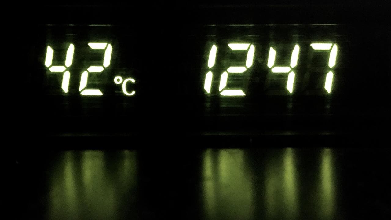 Temperature gauge on a vehicle showing 42 degrees