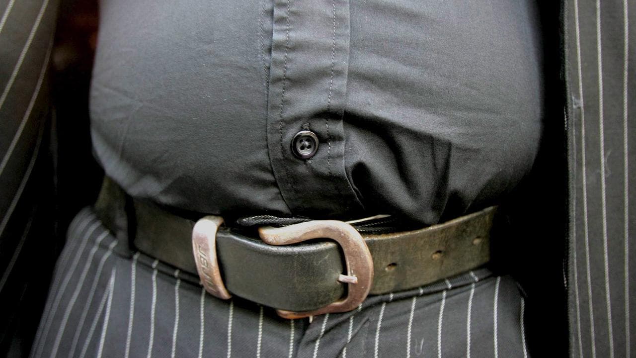 Overweight unidentified man in London, 16 December 2005.