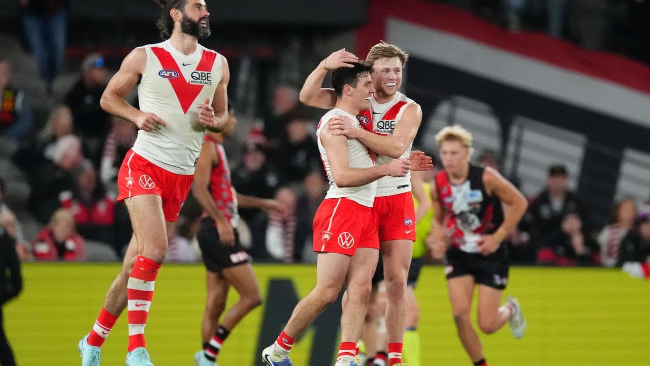Sydney teammates congratulate Errol Gulden.