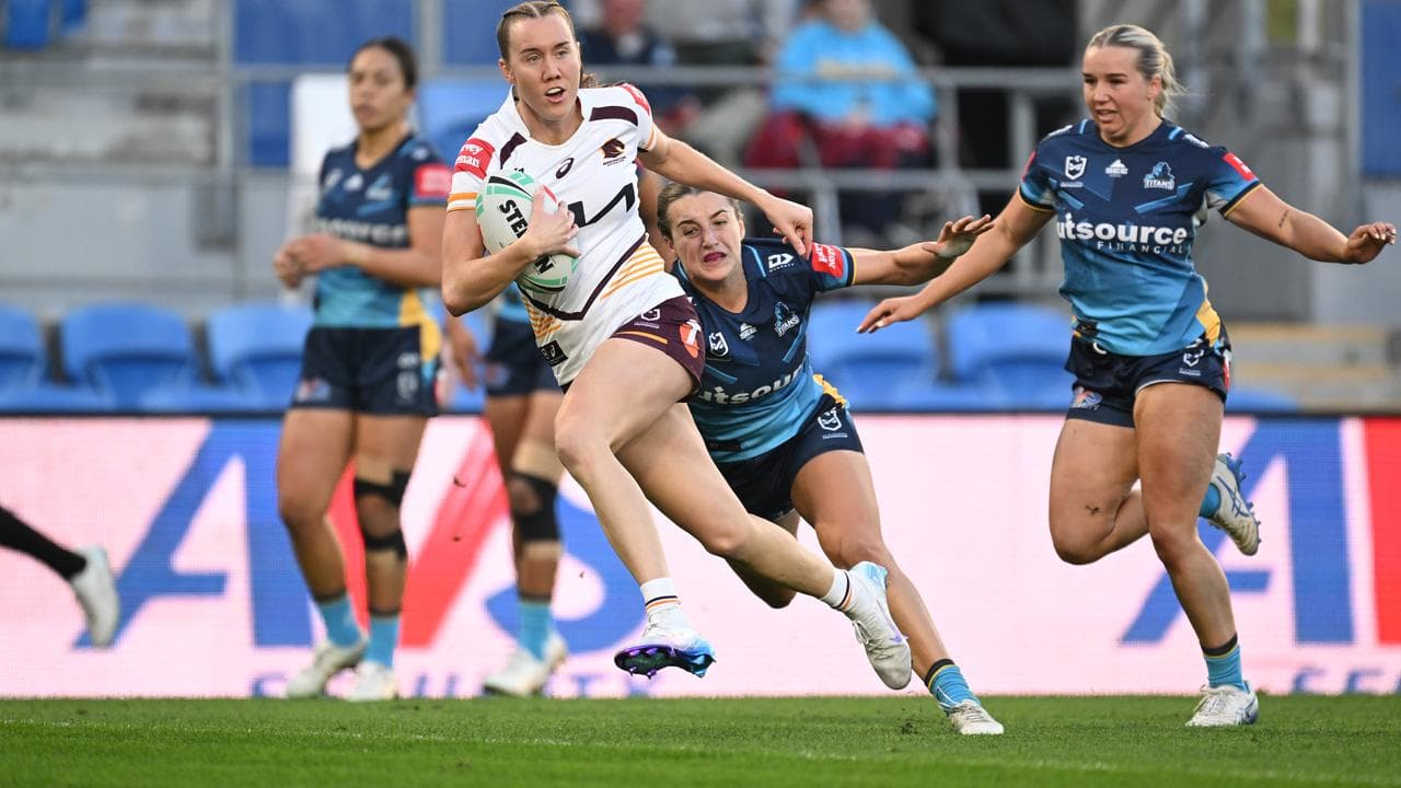 Brisbane's Tamika Upton breaks away to score.