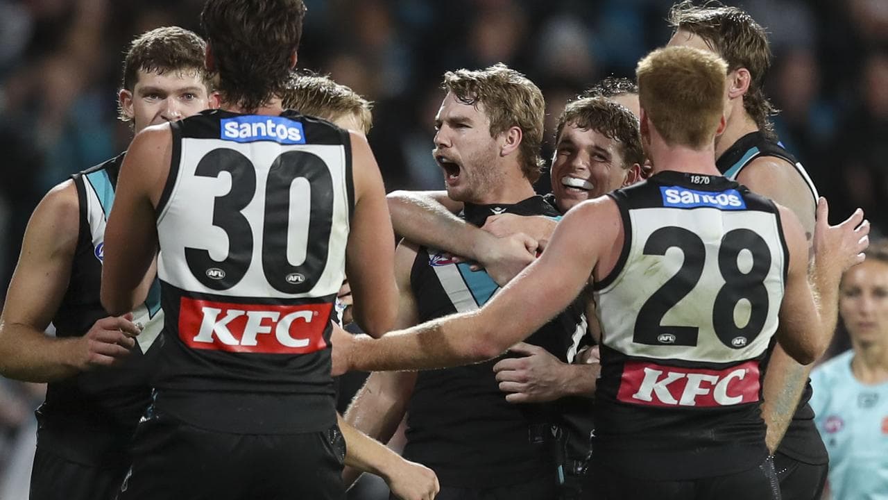 Port players celebrate their come-from-behind win