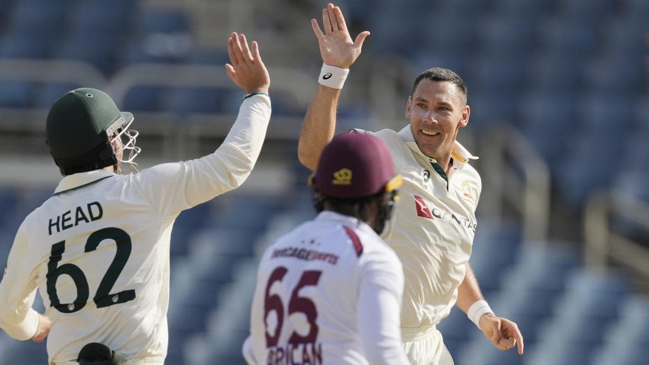 (L-R) Travis Head, Jomel Warrican and Scott Boland.