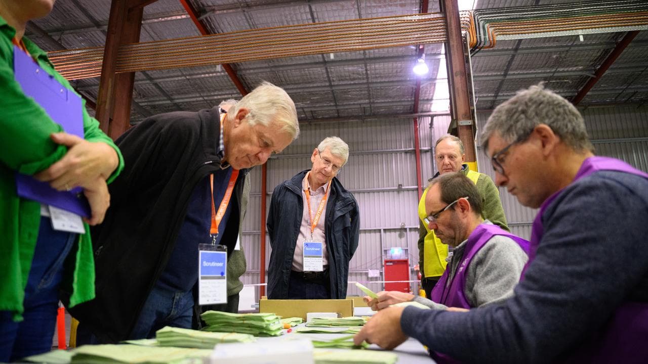 Election scrutineers during a recount