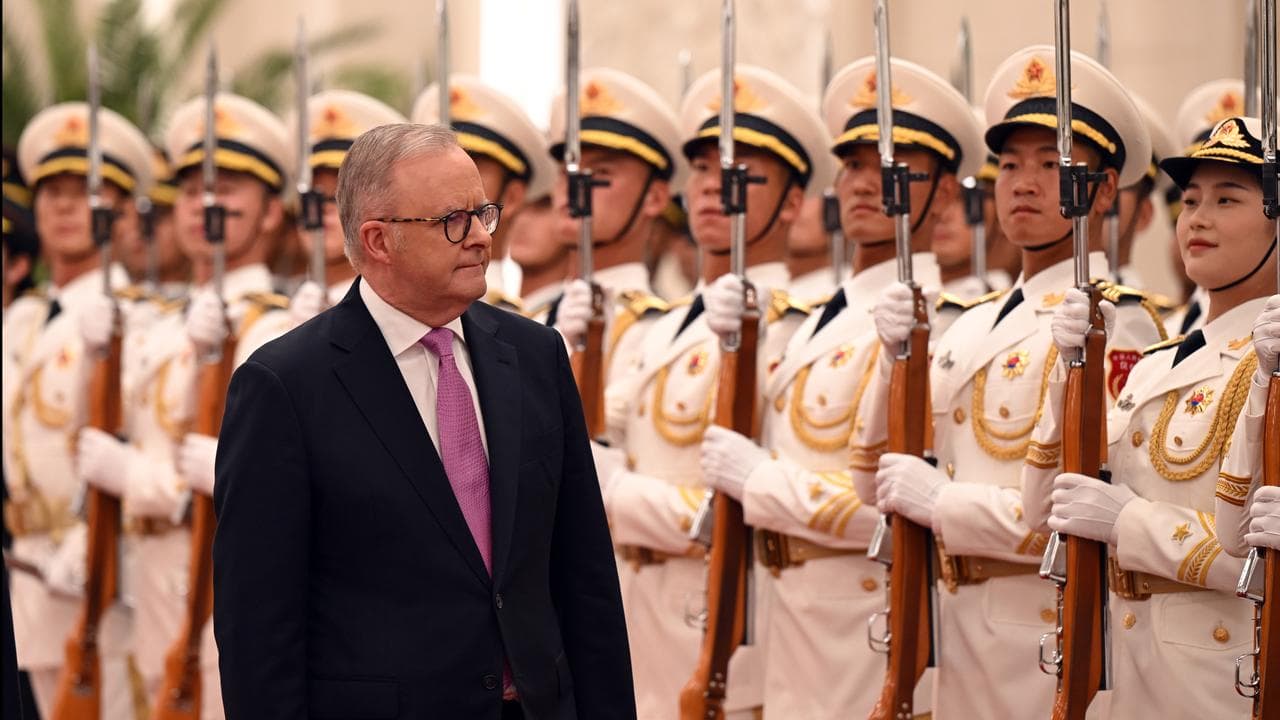 Prime Minister Anthony Albanese inspects an honour guard in Beijing
