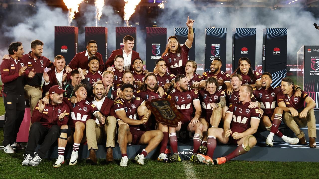 Celebrating Queensland players.