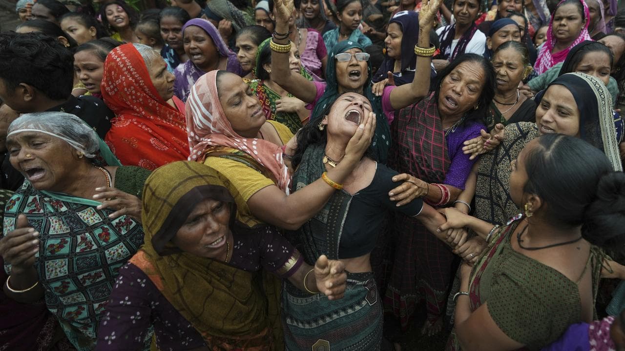 Family members of Akash Patni, a victim of the Air India plane crash
