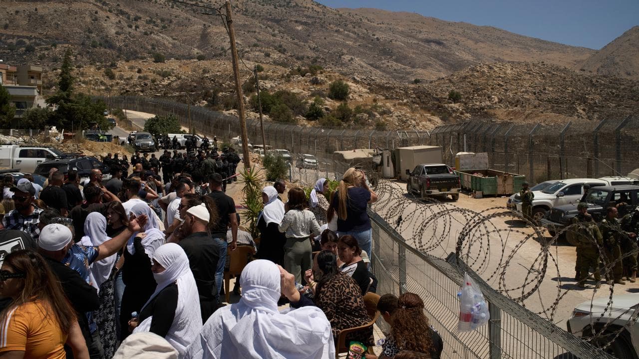 Members of the Israeli Druze community at the Israeli-Syrian border