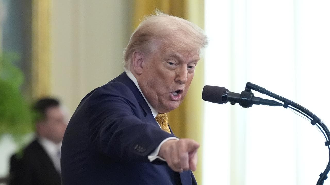US President Donald Trump speaks in the East Room of the White House