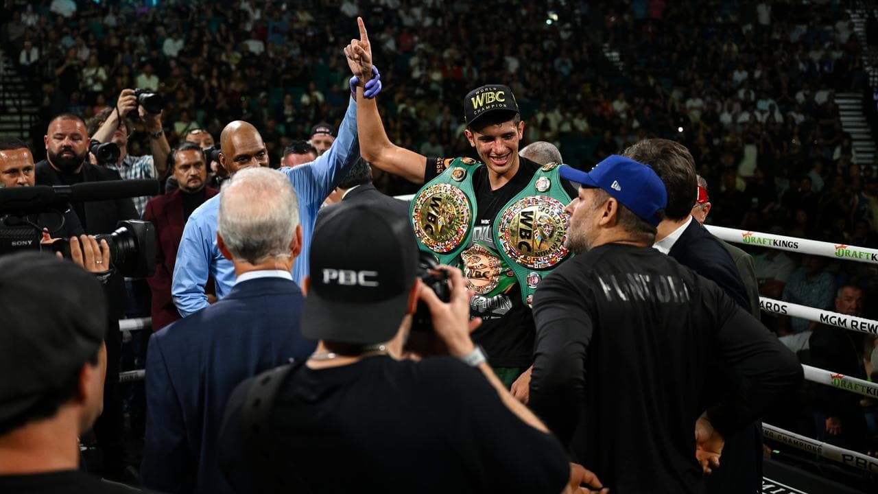 Sebastian Fundora has his arm raised in triumph