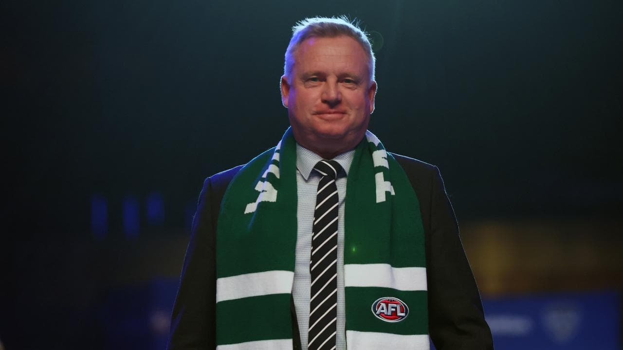 Jeremy Rockliff wearing a Tasmania Devils scarf