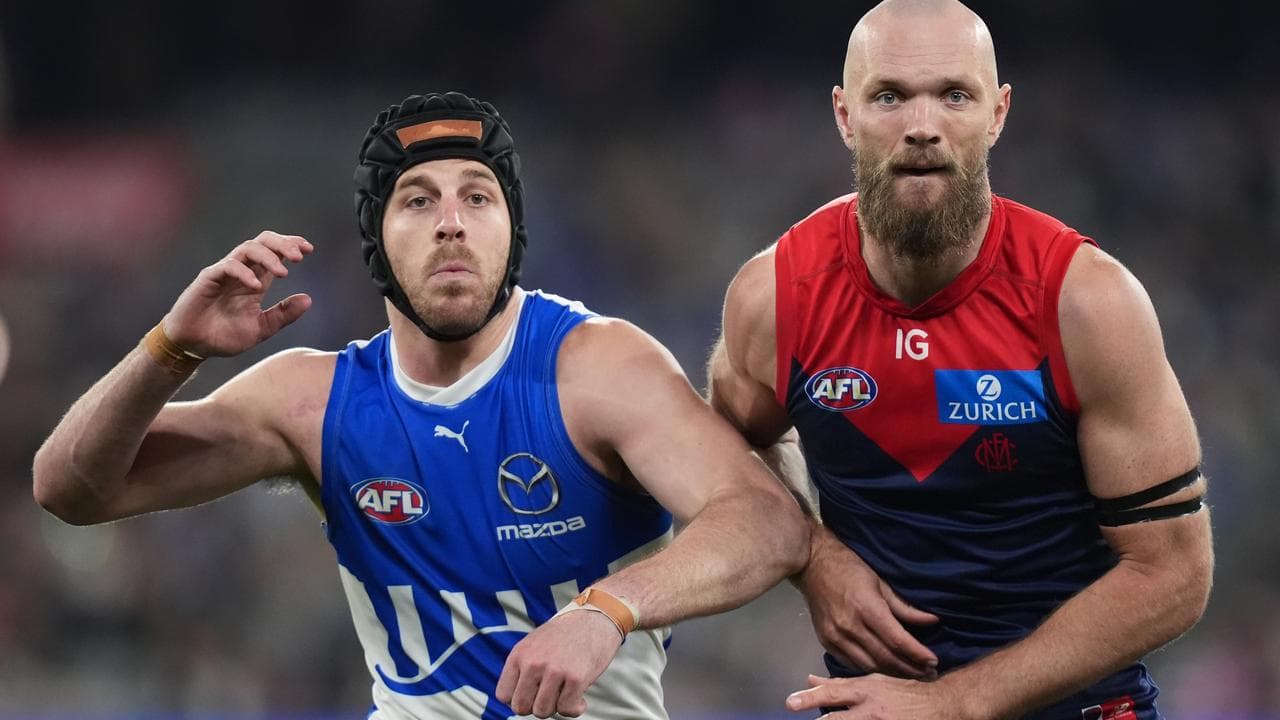 Tristan Xerri of the Kangaroos and Max Gawn of the Demons.