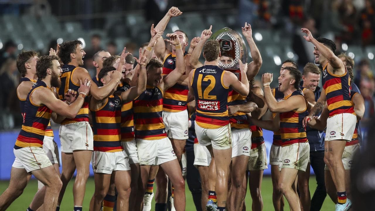 Celebrating Adelaide Crows players.