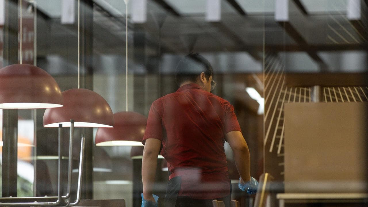 Retail and hospitality workers are seen in Melbourne