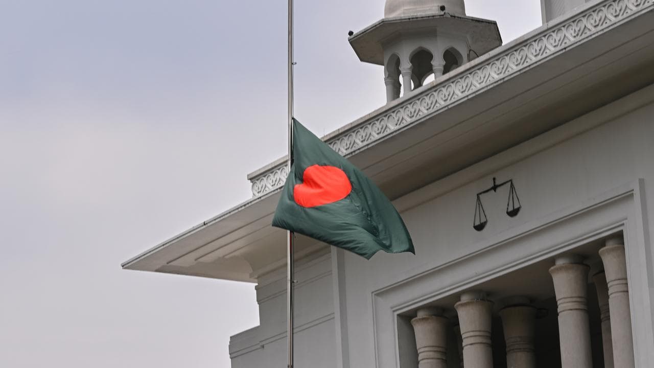 Bangladeshi flag at half-mast on a Supreme Court building